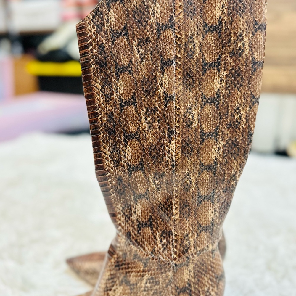 Louise et Cie Kamil brown leather pointed-toe knee-high boots.